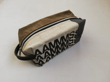 Afbeelding in Gallery-weergave laden, Canvas toiletry bag Amsterdam from recycled military canvas and bicycle inner tube, designed by Anne van Dijk. Photo 1 Frontside