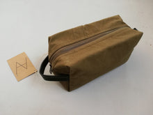 Load image into Gallery viewer, Canvas toiletry bag from recycled military canvas and bicycle inner tube, designed by Anne van Dijk. Photo 2 Backside
