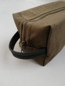 Canvas toiletry bag from recycled military canvas and bicycle inner tube, designed by Anne van Dijk. Photo 3 Hanging Loop