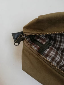 Canvas toiletry bag from recycled military canvas and bicycle inner tube, designed by Anne van Dijk. Photo 2 Interior