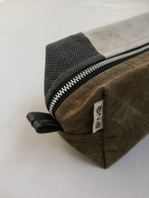 Load image into Gallery viewer, Canvas toiletry bag Amsterdam from recycled military canvas and bicycle inner tube, designed by Anne van Dijk. Photo 3 Zipper 
