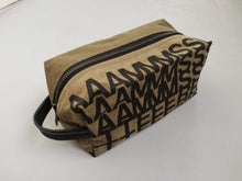 Load image into Gallery viewer, Canvas toiletry bag Amsterdam from recycled military canvas and bicycle inner tube, designed by Anne van Dijk. Photo 1 Frontside
