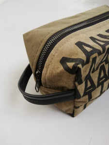 Canvas toiletry bag Amsterdam from recycled military canvas and bicycle inner tube, designed by Anne van Dijk. Photo 2 Hanging loop