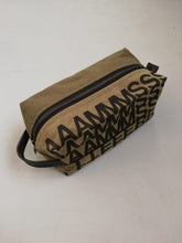 Load image into Gallery viewer, Canvas toiletry bag Amsterdam from recycled military canvas and bicycle inner tube, designed by Anne van Dijk. Photo 4 Backside
