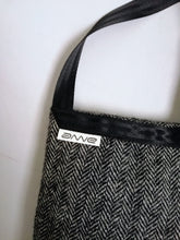 Load image into Gallery viewer, Classy crossbody bag handmade from the sleeve of a reused suit jacket, designed by Anne van Dijk, Color Grey Herringbone, Label close-up
