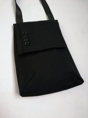 Classy crossbody bag handmade from the sleeve of a reused suit jacket, designed by Anne van Dijk, Color Black, Frontside.