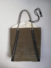 Load image into Gallery viewer, Handmade shopping bag from recycled military canvas, parachute and bicycle innertube. designed by Anne van Dijk
